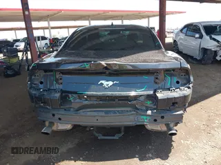 2022 Ford Mustang EcoBoost with VIN 1FA6P8TH9N5109501, listed as a IAAI auction lot 42437964 with 56,895 mi miles and . Bid and sale history available at DreamBid. Image 6.