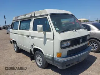 1991 Volkswagen Vanagon GL with VIN WV2ZB0258MG006802, listed as a IAAI auction lot 41969597 with 241,953 mi miles and . Bid and sale history available at DreamBid. Image 1.