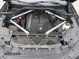 2020 BMW X5 xDrive40i with VIN 5UXCR6C09L9C95232, listed as a Copart auction lot 60697765 with 30,017 mi miles and Salvage title. Bid and sale history available at DreamBid. Image 12.
