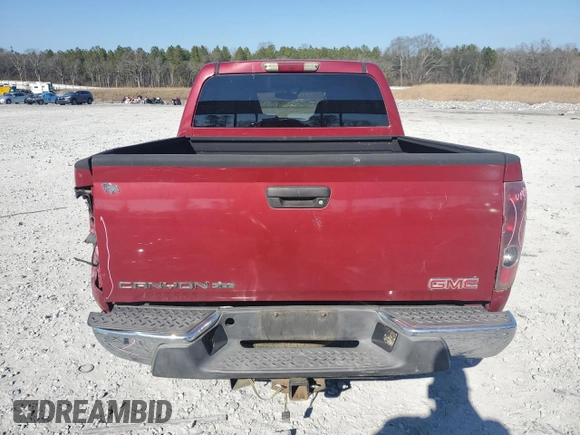 2004 GMC Canyon 1SB SLE Z85 with VIN 1GTCS136248111721, listed as a Copart auction lot 44143595 with 198,030 mi miles and Salvage Title. Bid and sale history available at carsss.com. Image 6.