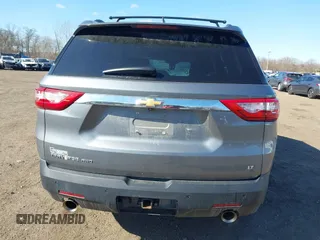 2021 Chevrolet Traverse LT Cloth with VIN 1GNEVGKW2MJ146411, listed as a IAAI auction lot 41694651 with 57,673 mi miles. Bid and sale history available at carsss.com. Image 16.