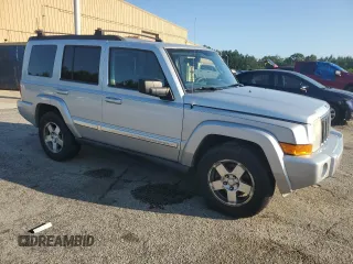 2010 Jeep Commander Sport with VIN 1J4RG4GK4AC125711, listed as a Copart auction lot 60369545 with 209,522 mi miles and Clean title. Bid and sale history available at DreamBid. Image 4.