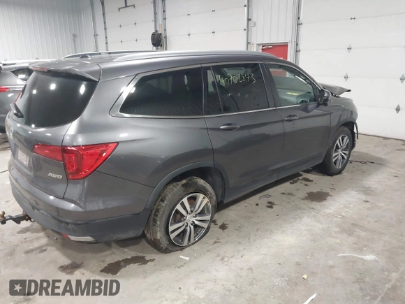 2017 Honda Pilot EX-L with VIN 5FNYF6H51HB080796, listed as a IAAI auction lot 40702843 with Not Provided miles and . Bid and sale history available at DreamBid. Image 4.