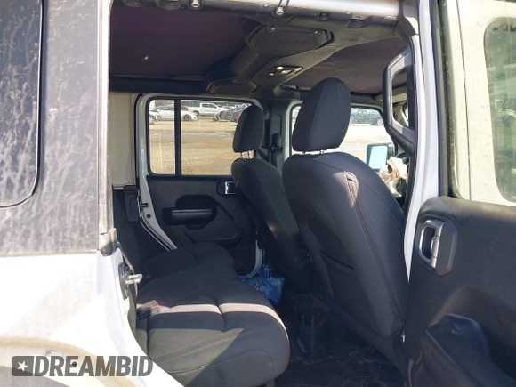 2020 Jeep Wrangler Unlimited Sport with VIN 1C4HJXDM2LW262867, listed as a IAAI auction lot 42303520 with 56,461 mi miles and . Bid and sale history available at DreamBid. Image 8.