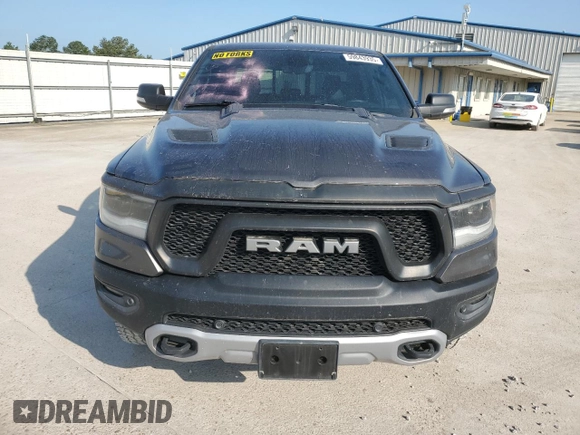 2020 Ram 1500 Rebel with VIN 1C6SRFLT4LN144723, listed as a Copart auction lot 59843935 with 90,936 mi miles and Salvage title. Bid and sale history available at DreamBid. Image 5.