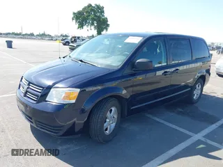 2010 Dodge Grand Caravan SE with VIN 2D4RN4DEXAR195055, listed as a IAAI auction lot 42012341 with 90,748 mi miles and . Bid and sale history available at DreamBid. Image 2.