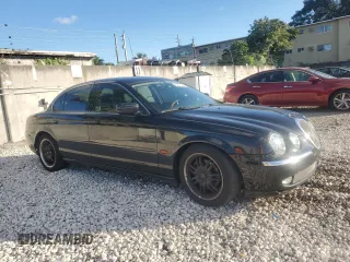 2000 Jaguar S-Type V8 z VIN SAJDA01D4YGL61655, wystawiony jako Copart lot #85873054 z przebiegiem 85 239 mil mil oraz Nie do naprawy • Non repairable. Historia ofert i sprzedaży dostępna na DreamBid. Obrazek 4.