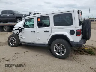 2023 Jeep Wrangler Sahara with VIN 1C4HJXEG6PW577427, listed as a Copart auction lot 57229185 with Not provided miles and Non repairable. Bid and sale history available at DreamBid. Image 2.