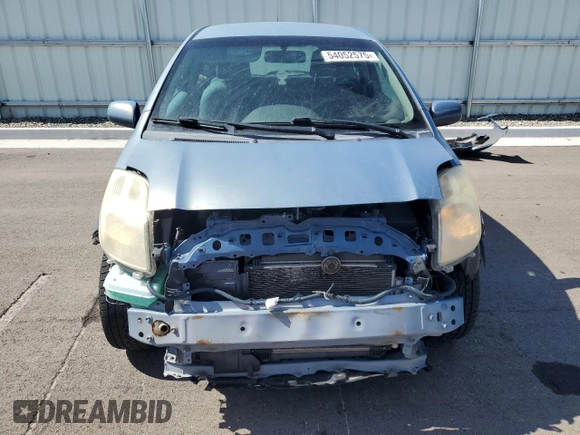 2008 Toyota Yaris with VIN JTDJT923185164654, listed as a Copart auction lot 54052575 with 242,505 mi miles and Salvage Title. Bid and sale history available at DreamBid. Image 5.