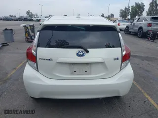 2015 Toyota Prius c One with VIN JTDKDTB3XF1097538, listed as a IAAI auction lot 42031057 with 100,847 mi miles. Bid and sale history available at carsss.com. Image 16.