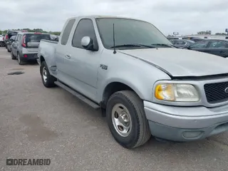2003 Ford F-150 XL with VIN 1FTRX07253KB95404, listed as a IAAI auction lot 41945734 with 1 mi miles. Bid and sale history available at carsss.com. Image 1.