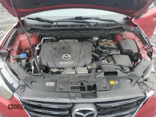 2016 Mazda CX-5 Sport with VIN JM3KE4BY1G0768530, listed as a Copart auction lot 60521795 with 118,132 mi miles and Salvage title. Bid and sale history available at DreamBid. Image 12.
