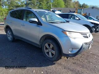 2013 Toyota RAV4 XLE with VIN JTMRFREV9DD013682, listed as a IAAI auction lot 42142414 with 202,680 mi miles. Bid and sale history available at carsss.com. Image 1.