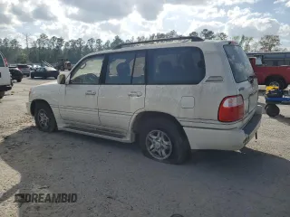 2002 Lexus LX 470 z VIN JTJHT00W623517039, wystawiony jako Copart lot #51458785 z przebiegiem 219 906 mil mil oraz Tytuł czysty. Historia ofert i sprzedaży dostępna na DreamBid. Obrazek 2.