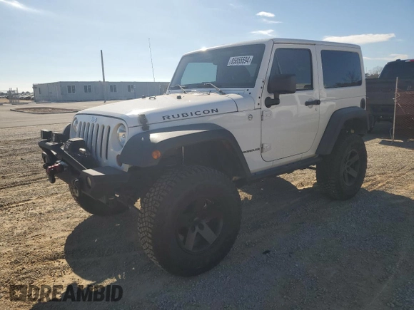 2013 Jeep Wrangler Rubicon with VIN 1C4BJWCG3DL590006, listed as a Copart auction lot 85855594 with 99,218 mi miles and Salvage title. Bid and sale history available at DreamBid. Image 1.