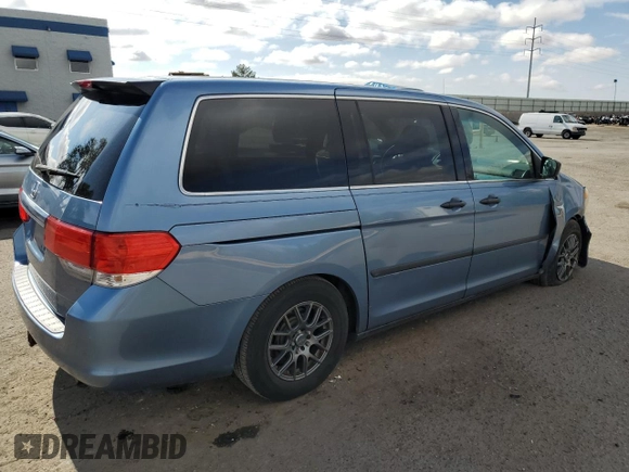 2010 Honda Odyssey LX with VIN 5FNRL3H23AB054658, listed as a Copart auction lot 62322195 with 160,550 mi miles and Salvage title. Bid and sale history available at DreamBid. Image 3.