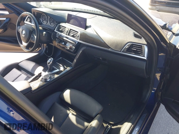 2018 BMW 3 Series 330i with VIN WBA8B9C50JAE22077, listed as a IAAI auction lot 42021848 with 34,229 mi miles and . Bid and sale history available at DreamBid. Image 5.