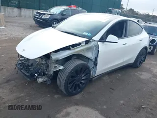 2021 Tesla Model Y Performance with VIN 5YJYGDEF1MF262930, listed as a IAAI auction lot 41606321 with 28,882 mi miles and . Bid and sale history available at DreamBid. Image 21.