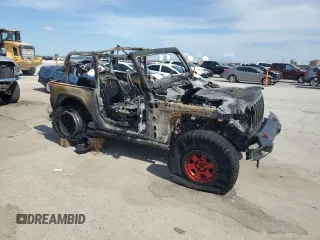 2021 Jeep Wrangler Rubicon with VIN 1C4HJXCG2MW807639, listed as a Copart auction lot 50533135 with Not provided miles and Non repairable. Bid and sale history available at DreamBid. Image 4.