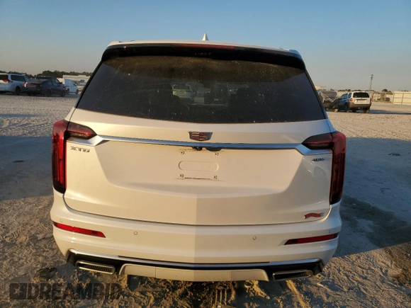 2024 Cadillac XT6 FWD Premium Luxury with VIN 1GYKPCRS8RZ729053, listed as a Copart auction lot 83040574 with 11,435 mi miles and Salvage Title. Bid and sale history available at carsss.com. Image 6.