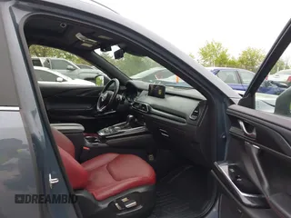 2023 Mazda CX-9 Grand Touring with VIN JM3TCBDY2P0636226, listed as a IAAI auction lot 42384360 with 161,352 mi miles and . Bid and sale history available at DreamBid. Image 5.