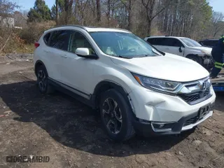 2018 Honda CR-V Touring with VIN 2HKRW2H96JH690197, listed as a IAAI auction lot 41902741 with 34,637 mi miles. Bid and sale history available at carsss.com. Image 6.