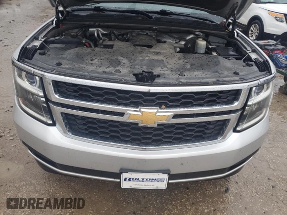 2016 Chevrolet Suburban LT with VIN 1GNSKHKC1GR257416, listed as a Copart auction lot 80993814 with 142,470 mi miles and Salvage Title. Bid and sale history available at DreamBid. Image 12.