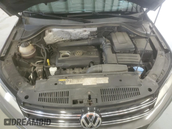 2013 Volkswagen Tiguan SE z VIN WVGBV3AX7DW613495, wystawiony jako Copart lot #59922995 z przebiegiem 224 725 mil mil oraz Czysty tytuł • Clean title. Historia ofert i sprzedaży dostępna na DreamBid. Obrazek 12.