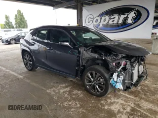 2023 Lexus UX 250h F Sport with VIN JTHB9JBHXP2065586, listed as a Copart auction lot 59037755 with 23,620 mi miles and Salvage title. Bid and sale history available at DreamBid. Image 4.