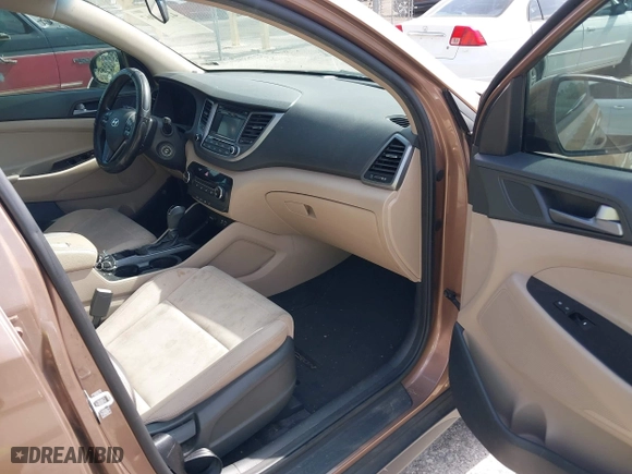 2016 Hyundai Tucson SE with VIN KM8J23A4XGU180300, listed as a IAAI auction lot 42123067 with 123,804 mi miles. Bid and sale history available at carsss.com. Image 5.