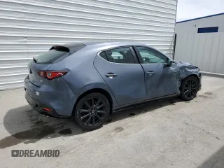 2023 Mazda 3 S Carbon Edition с VIN JM1BPBLM2P1611392, выставлен на аукционе Copart как лот 56292325 с пробегом 28 659 миль миль и На запчасти • Non repairable. История ставок и продаж доступна на DreamBid. Изображение 3.