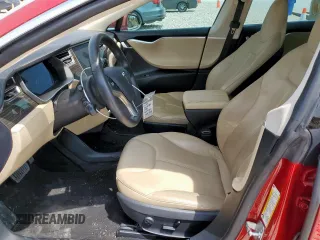2014 Tesla Model S 60 with VIN 5YJSA1H18EFP38582, listed as a Copart auction lot 56581735 with 69,106 mi miles and Salvage title. Bid and sale history available at DreamBid. Image 7.