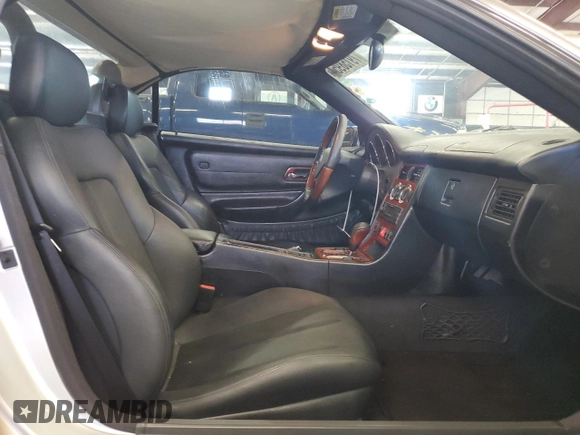 2003 Mercedes-Benz SLK 320 with VIN WDBKK65F83F280656, listed as a Copart auction lot 79158954 with 99,413 mi miles and Salvage title. Bid and sale history available at DreamBid. Image 10.