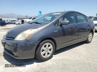 2007 Toyota Prius z VIN JTDKB20U873277912, wystawiony jako Copart lot #61479525 z przebiegiem 244 584 mil mil oraz Czysty tytuł • Clean title. Historia ofert i sprzedaży dostępna na DreamBid. Obrazek 1.