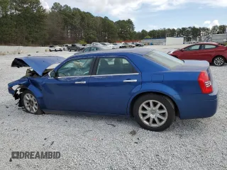 2009 Chrysler 300 LX with VIN 2C3KA43D29H581073, listed as a Copart auction lot 48702345 with 142,917 mi miles and Salvage Title. Bid and sale history available at carsss.com. Image 2.