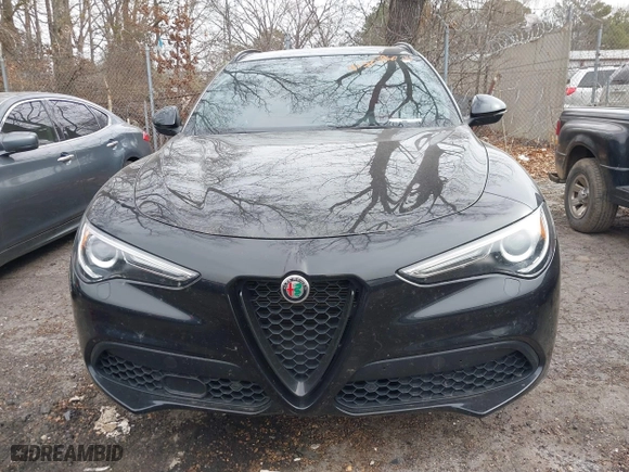 2023 Alfa Romeo Stelvio Ti with VIN ZASPAKBN6P7D56722, listed as a IAAI auction lot 41363962 with 50,073 mi miles. Bid and sale history available at carsss.com. Image 13.