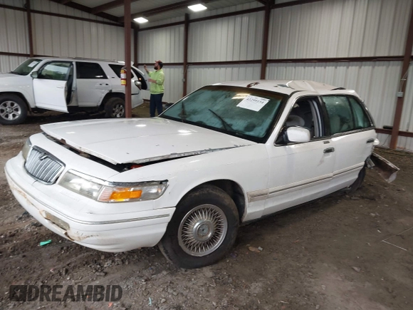 1997 Mercury Grand Marquis GS z VIN 2MELM74W6VX680292, wystawiony jako IAAI lot #42299154 z przebiegiem 208 666 mil mil oraz . Historia ofert i sprzedaży dostępna na DreamBid. Obrazek 2.