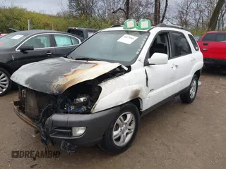 2006 Kia Sportage LX z VIN KNDJE723267254864, wystawiony jako IAAI lot #40875961 z przebiegiem 295 412 mil mil oraz . Historia ofert i sprzedaży dostępna na DreamBid. Obrazek 2.