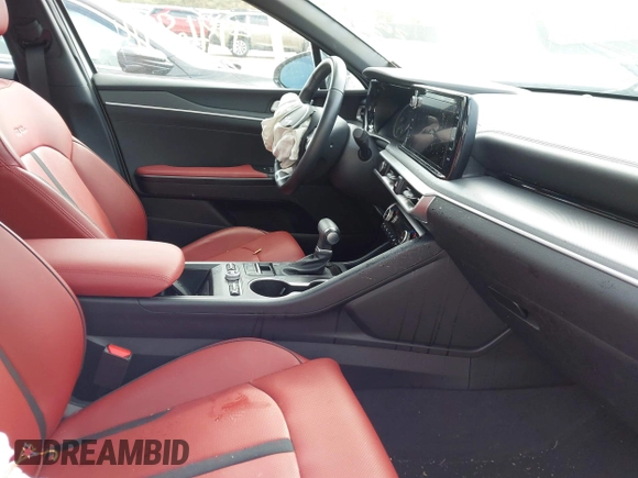 2024 Kia K5 GT-Line z VIN 5XXG64J27RG263411, wystawiony jako IAAI lot #41968914 z przebiegiem 23 238 mil mil oraz . Historia ofert i sprzedaży dostępna na DreamBid. Obrazek 5.