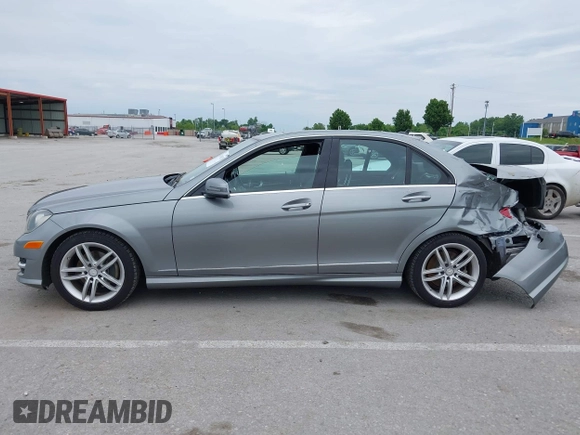 2014 Mercedes-Benz C 250 Sport with VIN WDDGF4HB6EG160494, listed as a IAAI auction lot 42310423 with 145,160 mi miles and . Bid and sale history available at DreamBid. Image 14.