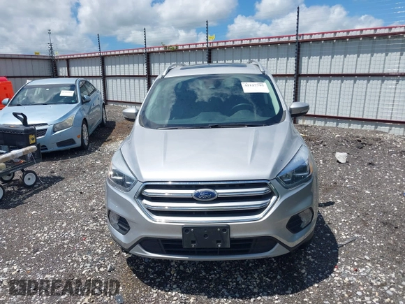 2017 Ford Escape Titanium with VIN 1FMCU0J99HUB23567, listed as a IAAI auction lot 42127795 with 93,056 mi miles. Bid and sale history available at carsss.com. Image 12.