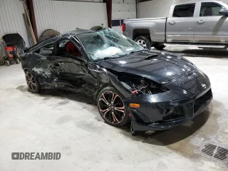 2000 Toyota Celica GT z VIN JTDDR32T4Y0040075, wystawiony jako Copart lot #81778264 z przebiegiem 237 802 mil mil oraz Szkody całkowita. Historia ofert i sprzedaży dostępna na DreamBid. Obrazek 4.