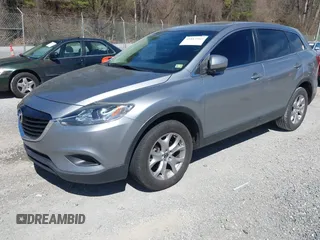 2015 Mazda CX-9 Sport with VIN JM3TB2BA7F0450544, listed as a IAAI auction lot 41812565 with 81,727 mi miles and . Bid and sale history available at carsss.com. Image 2.