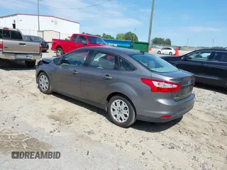 2012 Ford Focus SE with VIN 1FAHP3F22CL456552, listed as a IAAI auction lot 42341696 with 129,699 mi miles and . Bid and sale history available at DreamBid. Image 3.