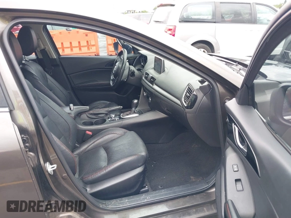 2014 Mazda 3 S Grand Touring with VIN JM1BM1M3XE1164610, listed as a IAAI auction lot 42421946 with 96,591 mi miles and . Bid and sale history available at DreamBid. Image 5.