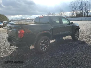 2024 GMC Canyon 4WD AT4 with VIN 1GTP6DEK2R1180037, listed as a Copart auction lot 85656994 with 7,565 mi miles and Salvage Title. Bid and sale history available at carsss.com. Image 3.