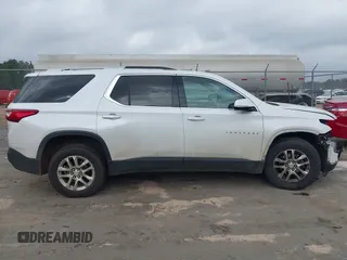 2018 Chevrolet Traverse LT Cloth z VIN 1GNERGKW8JJ279285, wystawiony jako IAAI lot #41795111 z przebiegiem 261 975 mil mil oraz . Historia ofert i sprzedaży dostępna na DreamBid. Obrazek 13.