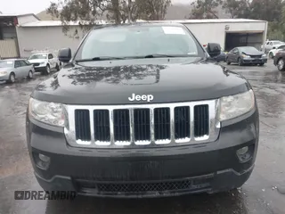 2011 Jeep Grand Cherokee Laredo z VIN 1J4RR4GG1BC566381, wystawiony jako IAAI lot #41547199 z przebiegiem 215 157 mil mil oraz . Historia ofert i sprzedaży dostępna na DreamBid. Obrazek 6.