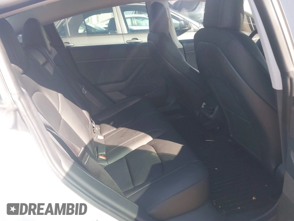 2020 Tesla Model 3 Long Range with VIN 5YJ3E1EBXLF636963, listed as a IAAI auction lot 41826249 with 68,085 mi miles. Bid and sale history available at carsss.com. Image 8.