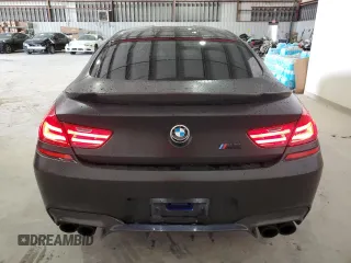 2016 BMW M6 z VIN WBS6E9C53GGF92658, wystawiony jako Copart lot #79003953 z przebiegiem 49 231 mil mil oraz . Historia ofert i sprzedaży dostępna na DreamBid. Obrazek 6.